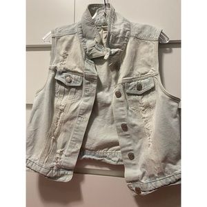 Light denim distressed vest